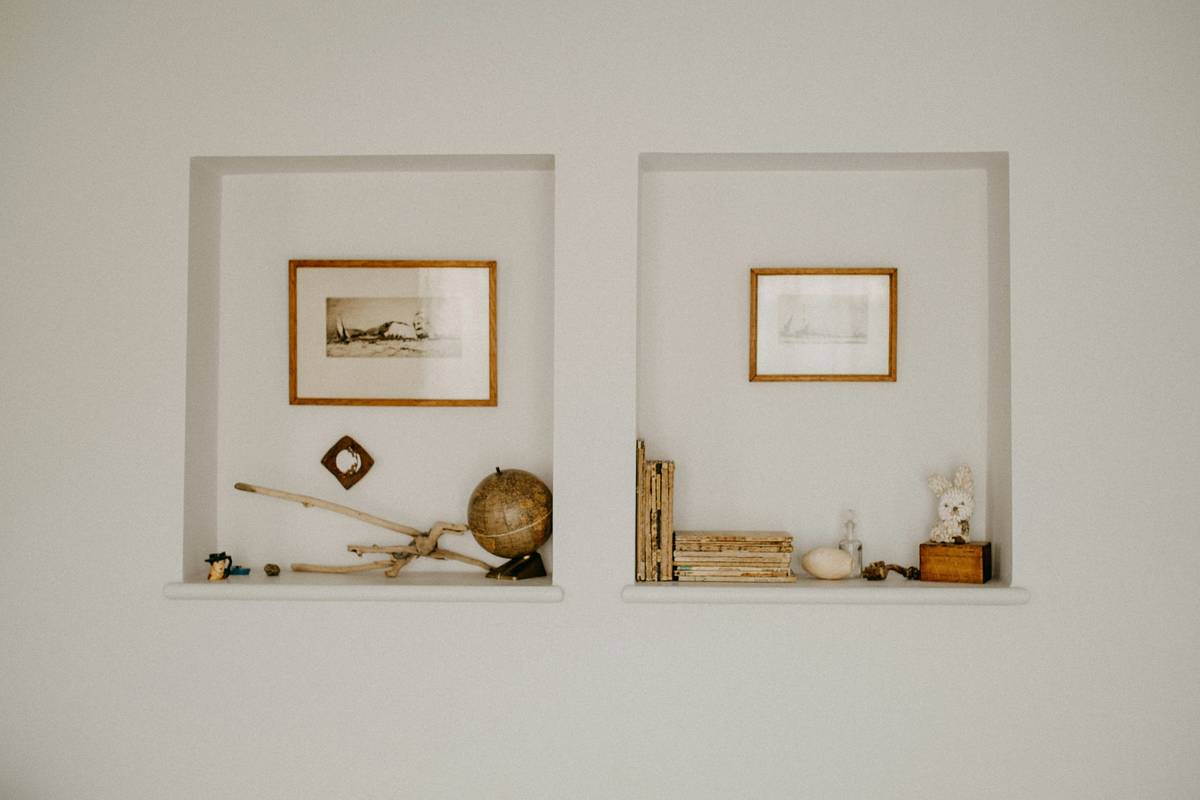 A shadow box display case deep enough to hold military medals, folded paper, and fabric without compression